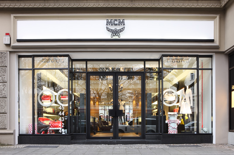 An MCM store exterior with the brand's logotype, illustrating the German luxury house